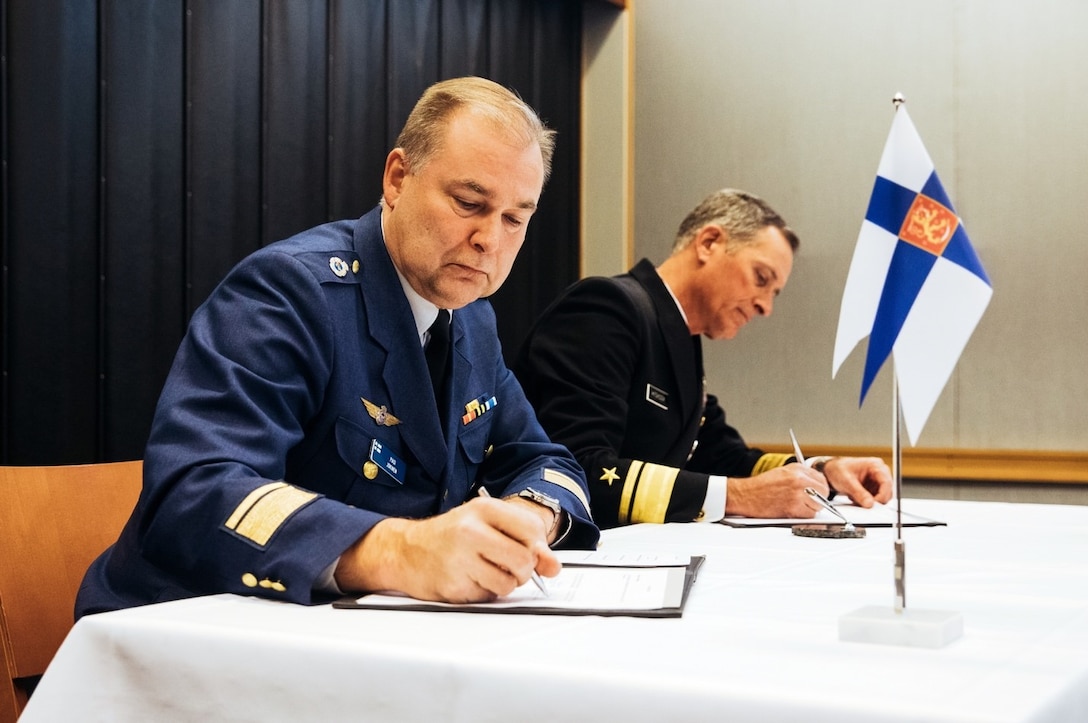 Rear Adm. Marcus A. Hitchcock, U.S. Space Command plans and policy director, and Maj. Gen. Pasi Jokinen, commander of the Finnish Air Force, sign a Memorandum of Understanding between the United States and Finland on Space Situational Awareness cooperation in Helsinki, Finland, Nov 4, 2019. As a key international partner, the Finnish Air Force develops Space Situational Awareness as an integrated part of Finnish Defence Forces’ joint situational awareness. (MoD of Finland photo by Finnish Air Force Public Affairs/Released)