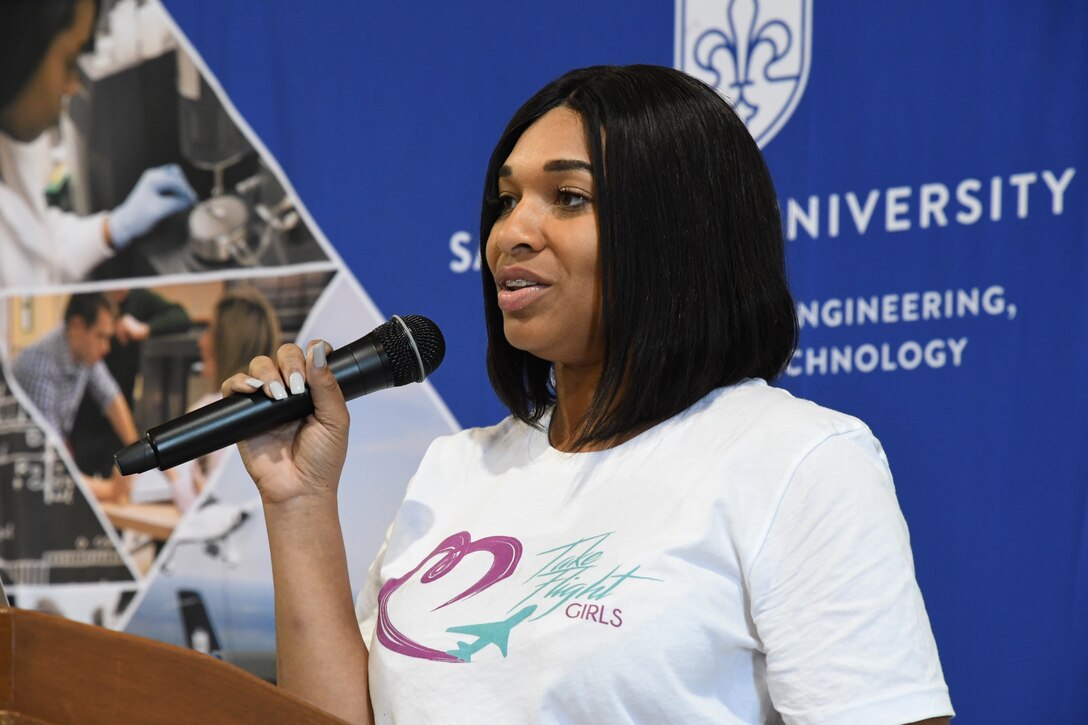 Various current and retired members of the 932nd Airlift Wing like Tech Sgt. Stephanie McCloud, from the operations area, were on hand at a Girls in Aviation event held at St. Louis Downtown Airport Oct. 4, 2019.  She talked about her reserve experience as an Airman.  The program is designed to bring awareness of training and job opportunities in industries related to flight.  The Air Force and Air Force Reserve recruiters were also available to share information.  (U.S. Air Force photo by Lt. Col. Stan Paregien)
