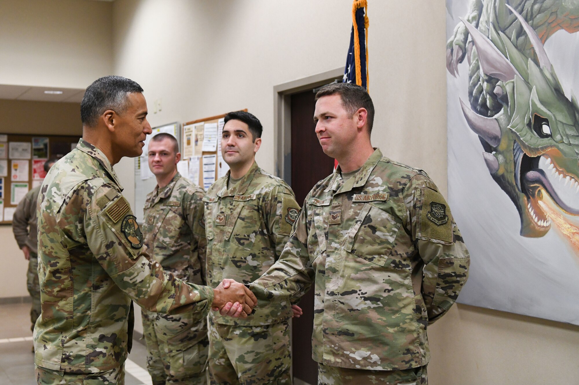 Airmen shake hands