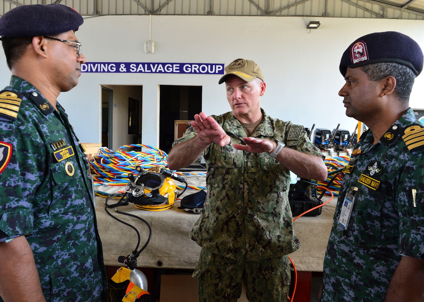 Chattogram, Bangladesh (Nov. 4, 2019) Rear Adm. Joey Tynch, commander, Logistics Group Western Pacific, speaks with senior delegates of the Special Warfare Diving and Salvage (SWADS) community as part of Cooperation Afloat Readiness and Training (CARAT) Bangladesh 2019. This year marks the 25th iteration of CARAT, a multinational exercise designed to enhance U.S. and partner navies' abilities to operate together in response to traditional and non-traditional maritime security challenges in the Indo-Pacific region.
