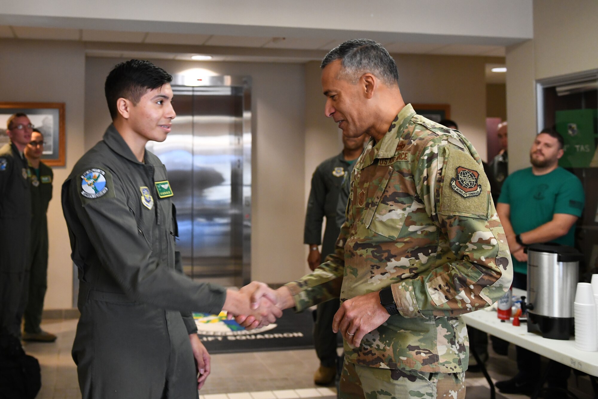 Airmen shake hands