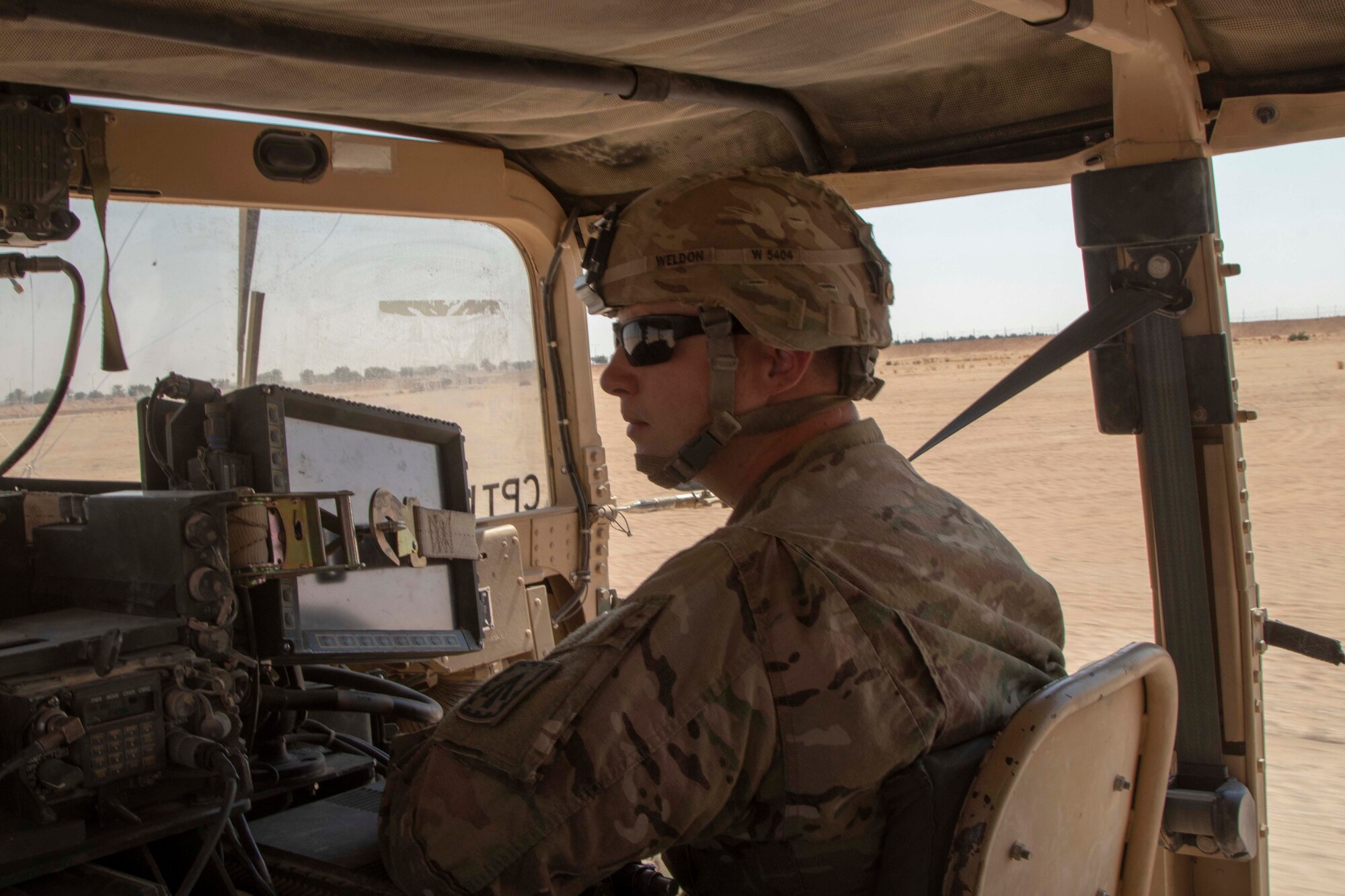 U.S. Army Staff Sgt. Brett Weldon a Patriot Launching Station Enhanced Operator-Maintainer  moves to Charlie Battery, 3rd Battalion, 4th Air Defense Artillery, 108th Air Defense Artillery Brigade equipment in order to conduct hot crew operations.