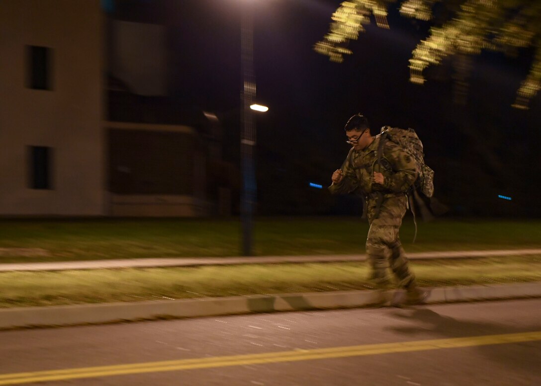 A U.S. Army Soldier runs to complete the Norwegian Foot March at Joint Base Langley-Eustis, Virginia, Oct. 30, 2019.