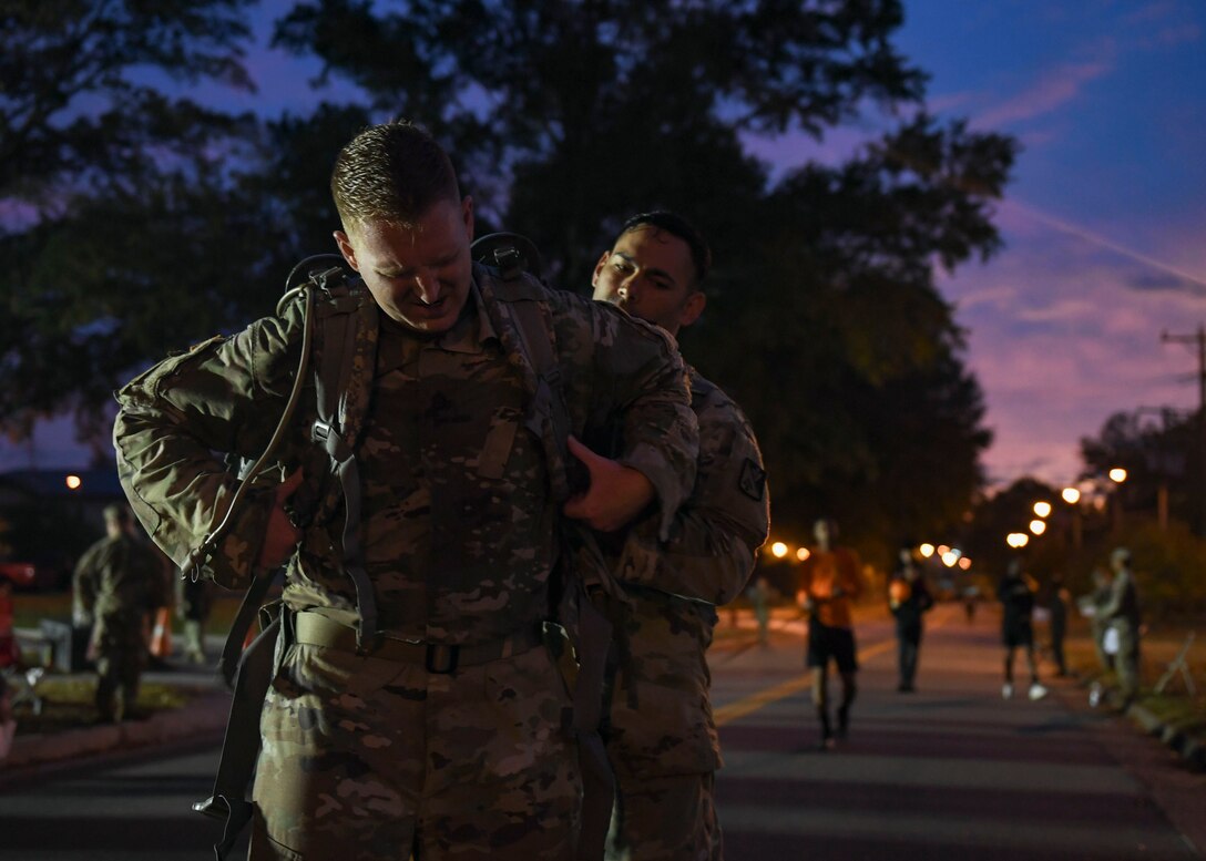 A U.S. Army Soldier removes his ruck sack after completing the Norwegian Foot March at Joint Base Langley-Eustis, Virginia, Oct. 30, 2019.