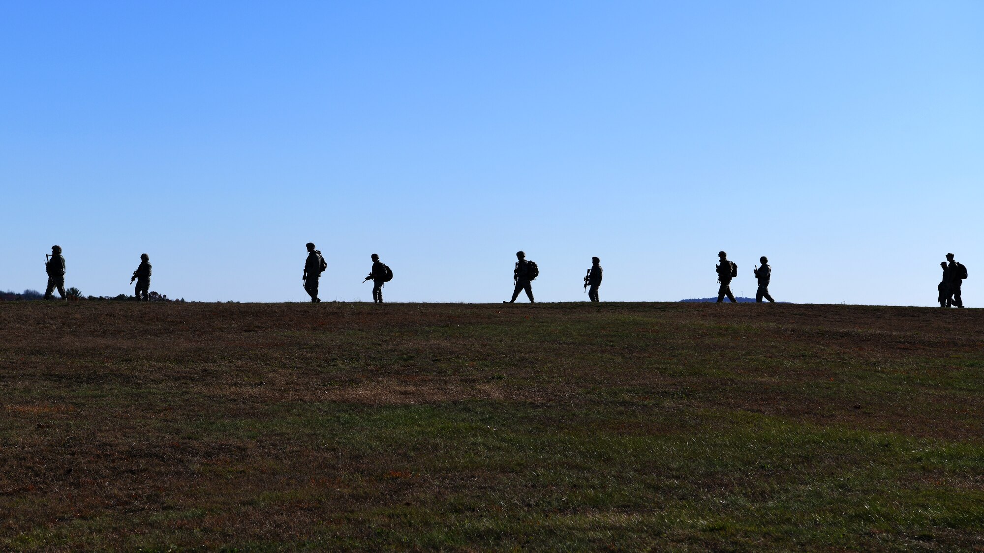 104th Fighter Wing defenders and firefighters run through simulated scenarios during a four day readiness exercise, Nov. 2, 2019, at Barnes Air National Guard Base,Massachusetts. Troughout the drill Airmen went between MOPP 2 and MOPP 4 in order to practice in case of a CBRN attack in a contested environment.   (U.S. Air National Guard photo by Airman 1st Class Sara Kolinski)