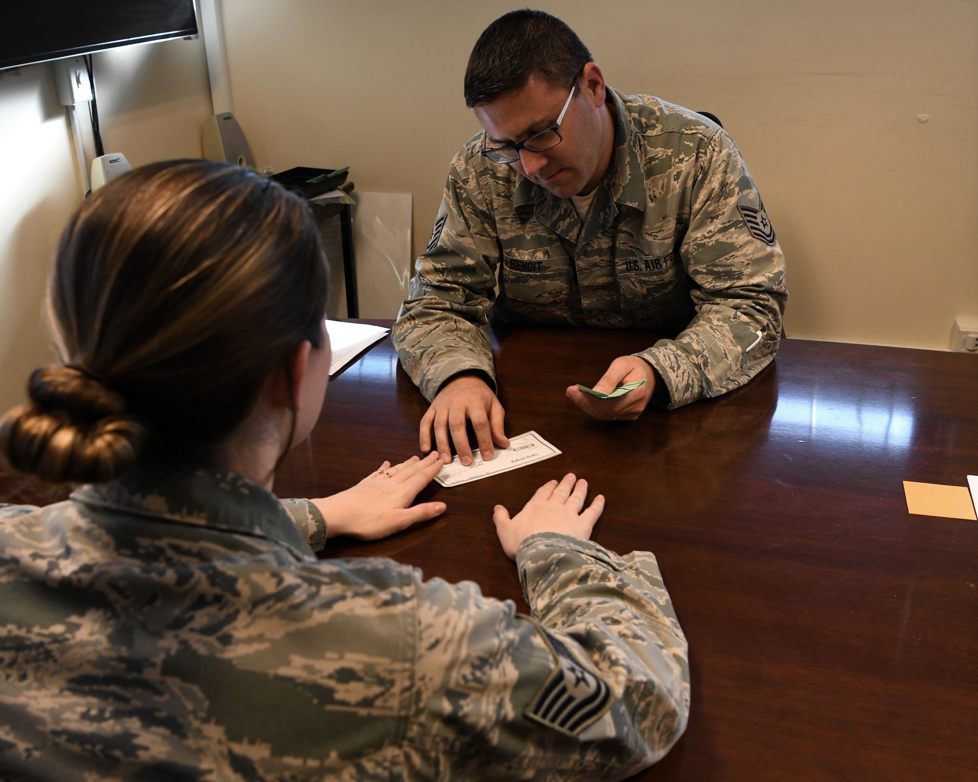 Airmen in the 104th Comptroller Flight run through simulated scenarios during a four day readiness exercise, Nov. 2, 2019, at Barnes Air National Guard Base,Massachusetts. Troughout the drill Airmen went between MOPP 2 and MOPP 4 in order to practice in case of a CBRN attack in a contested environment.   (U.S. Air National Guard photo by Airman 1st Class Sara Kolinski)