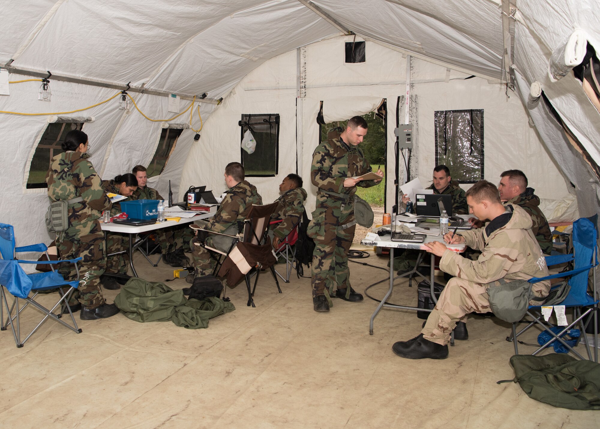 Contracting administrators with the 509th Contracting Squadron process contracts during a mock deployment exercise on Oct. 9, 2019, at Whiteman Air Force Base, Missouri. The Airmen split into two separate teams throughout the exercise, testing their skills and allowing them to compete with each other to build morale and ensure readiness. (U.S. Air Force photo by Airman 1st Class Parker J. McCauley)