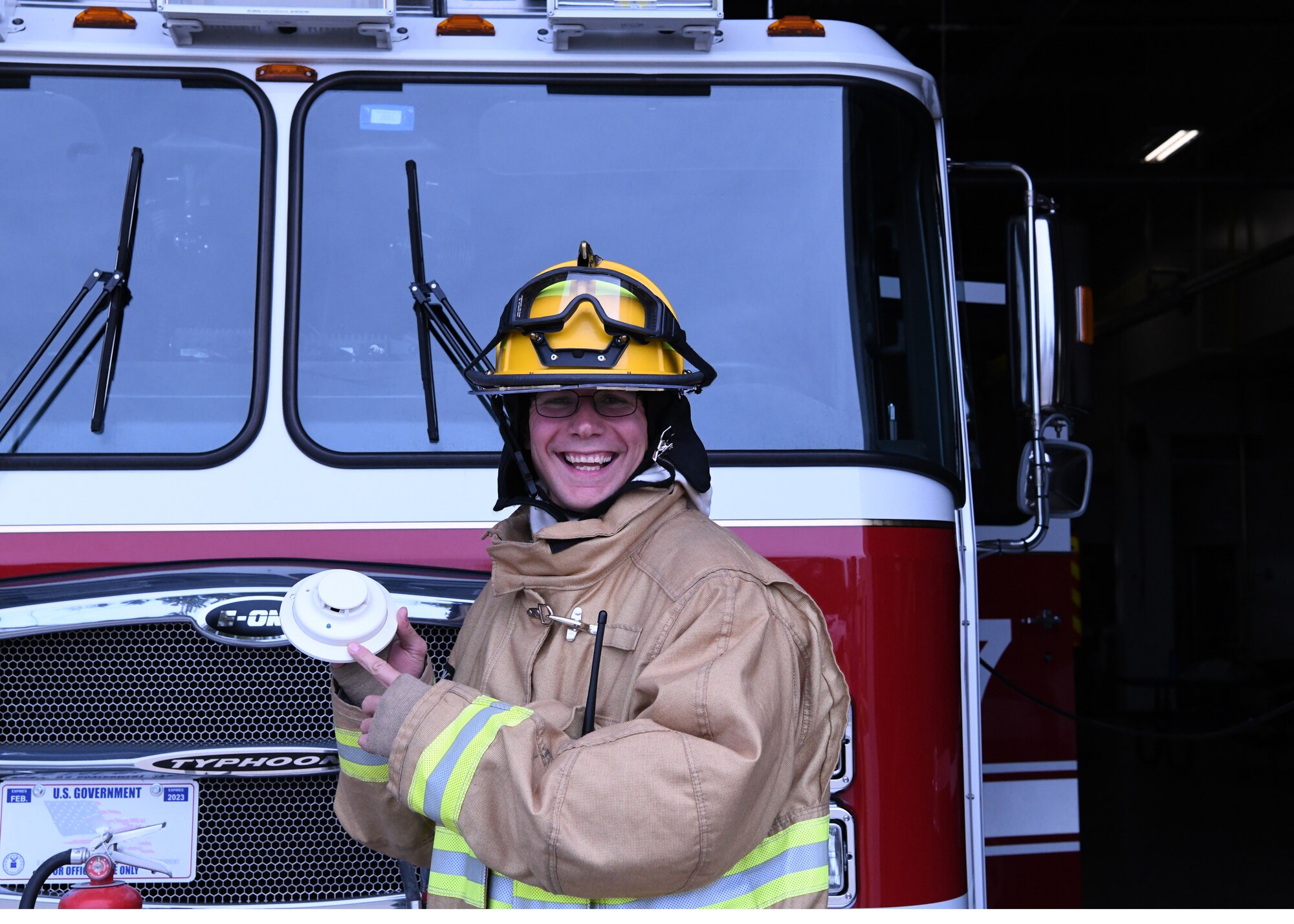 Firefighters from the 104 FW participate in fire prevention week on October 8, 2019. Staff Sgt. Sam Schrader a 104th firefighter,checks a smoke detector. According to the U.S. fire administration smoke detectors should be tested at least once a month and batteries should be replaced at least once or twice a year. (U.S. Air National Guard photo by Airman Basic Camille Lienau)