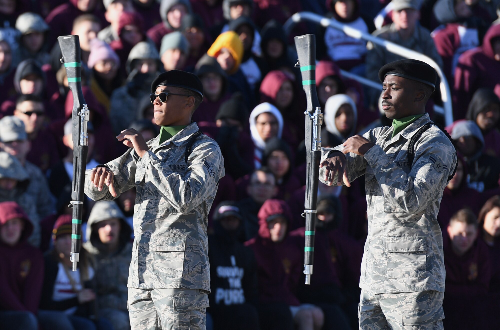 U.S. Air Force Airmen 1st Class Camron Richardson and Abdulahi Alausa, 334th Training Squadron freestyle drill team members, perform during the 81st Training Group drill down on the Levitow Training Support Facility drill pad at Keesler Air Force Base, Mississippi, Nov. 1, 2019. Airmen from the 81st TRG competed in a quarterly open ranks inspection, regulation drill routine and freestyle drill routine. Keesler trains more than 30,000 students each year. While in training, Airmen are given the opportunity to volunteer to learn and execute drill down routines. (U.S. Air Force photo by Kemberly Groue)