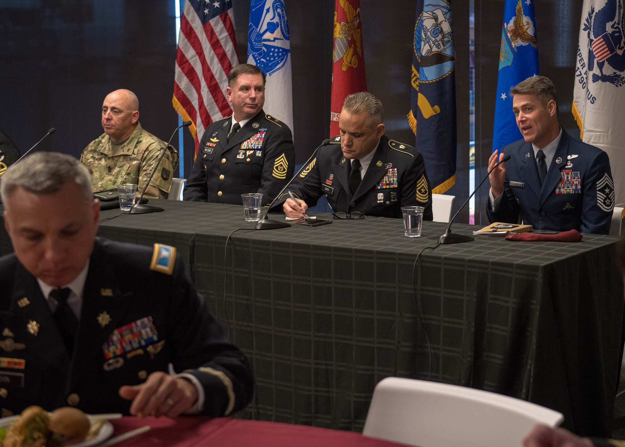 Chief Master Sgt. Ronald Thompson, 56th Fighter Wing command chief, speaks on key topics with fellow senior enlisted advisors during a panel discussion Nov. 1, 2019, at the Arizona State University Fulton Center in Tempe, Ariz.