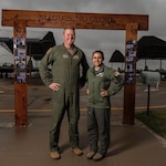 U.S. Air Force Maj. Nick Harris (left) and Capt. Jessica Wallander, instructor pilots with the 71st Flying Training Wing at Vance Air Force Base, Okla., stand side-by-side to illustrate the varying standing heights of Air Force pilots to dispel the myth that there is one height standard for all Air Force pilots.  Height waivers are available for candidates that do not meet AFI 48-123 standards.  If you are interested in learning more about height waivers, work with your commission source or contact the Air Force Call Center at 1-800-423-USAF. (U.S. Air Force Courtesy Photo)