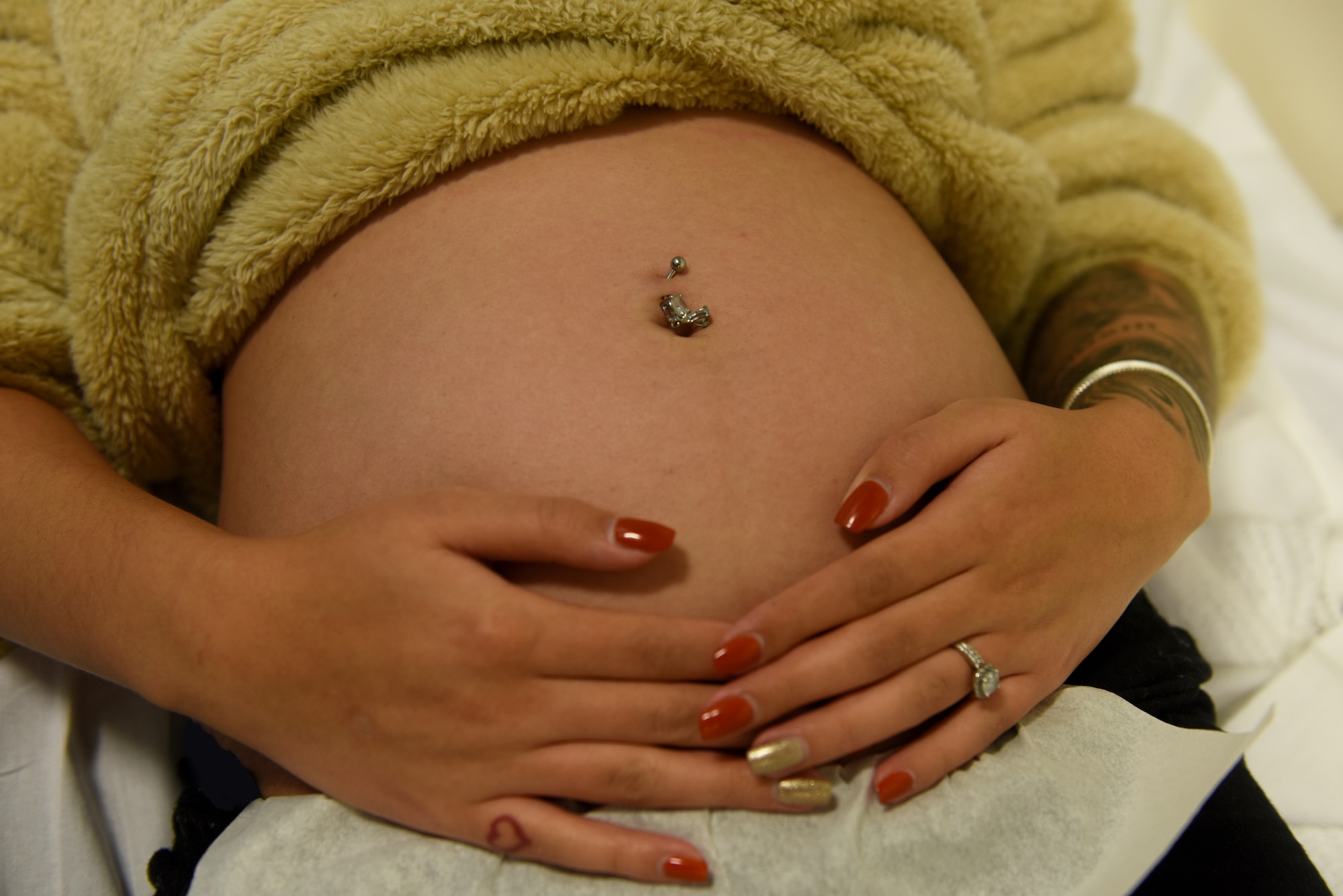 Samantha Gonzales, patient and participant of the Village Friends Group Obstetrics Care program, waits for a sonogram at Royal Air Force Lakenheath, England, Oct. 25, 2019. Village Friends still provide essential care that would be provided during a traditional one-on-one visit, such as taking vitals of the mother and providing sonograms to monitor fetal growth. (U.S. Air Force photo by Airman 1st Class Rhonda Smith)