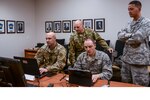About 30 members of the Pennsylvania National Guard joined state agencies at three locations Nov. 5 to ensure the security of the commonwealth’s general election. A team at the Pennsylvania Emergency Management Agency (above) focused on network monitoring, while teams at Fort Indiantown Gap and Horsham Air Guard Station focused on social media reporting.