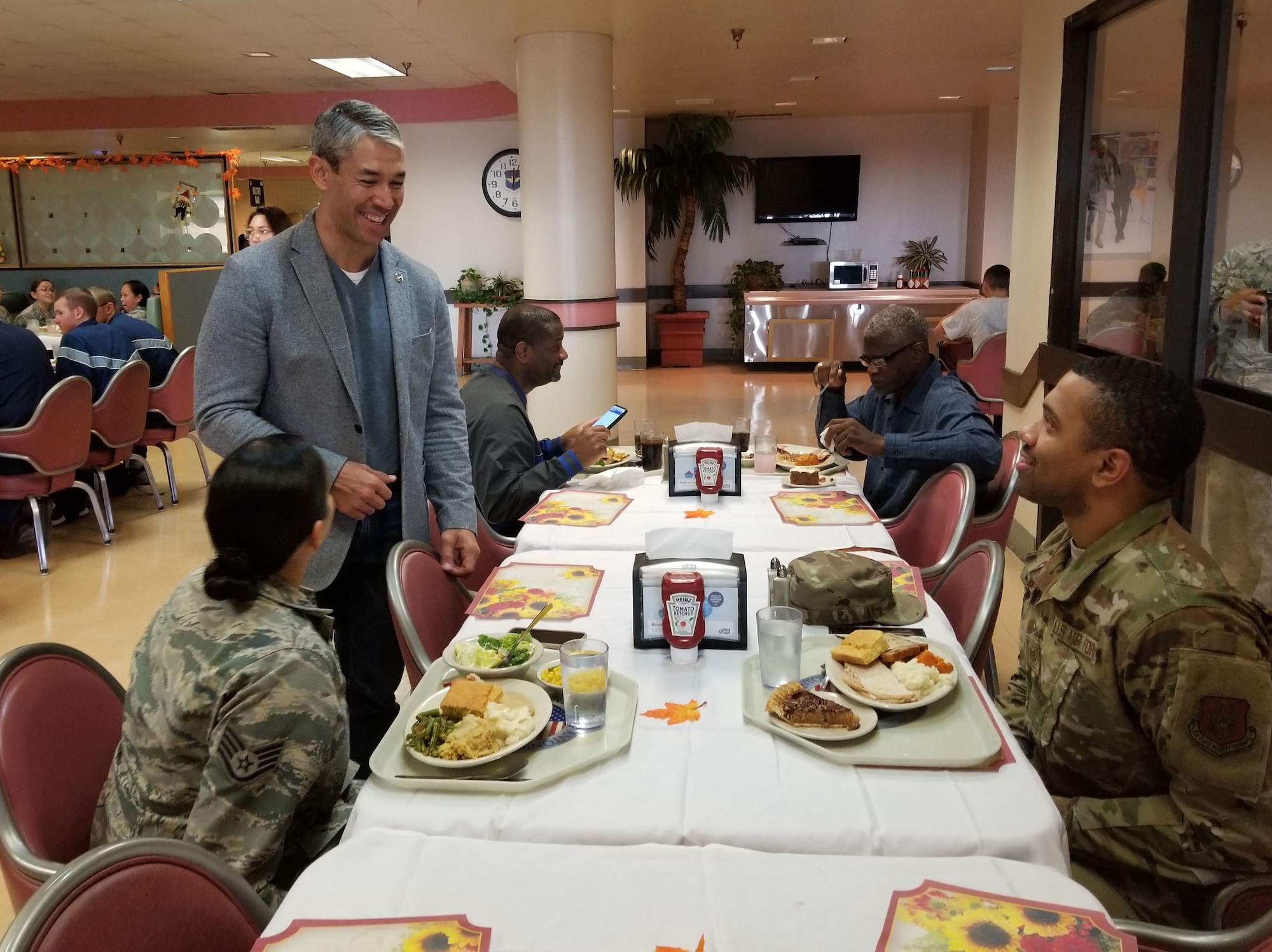 Ron Nirenberg, San Antonio mayor, visits with 433rd Airlift Wing Reserve Citizen Airmen after serving the Airmen a Thanksgiving feast at the Live Oak Dining Facility, Joint Base San Antonio-Lackland, Texas Nov. 2, 2019.