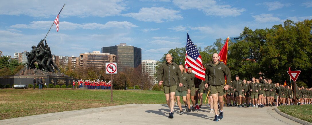 Commandant of the Marine Corps Gen. David H. Berger and Sergeant Major of the Marine Corps, Sgt. Maj. Troy E. Black join Headquarters and Service Battalion, Headquarters Marine Corps, Henderson Hall Marines during the 2019 Marine Corps birthday run in Arlington, Va., Nov. 5, 2019.