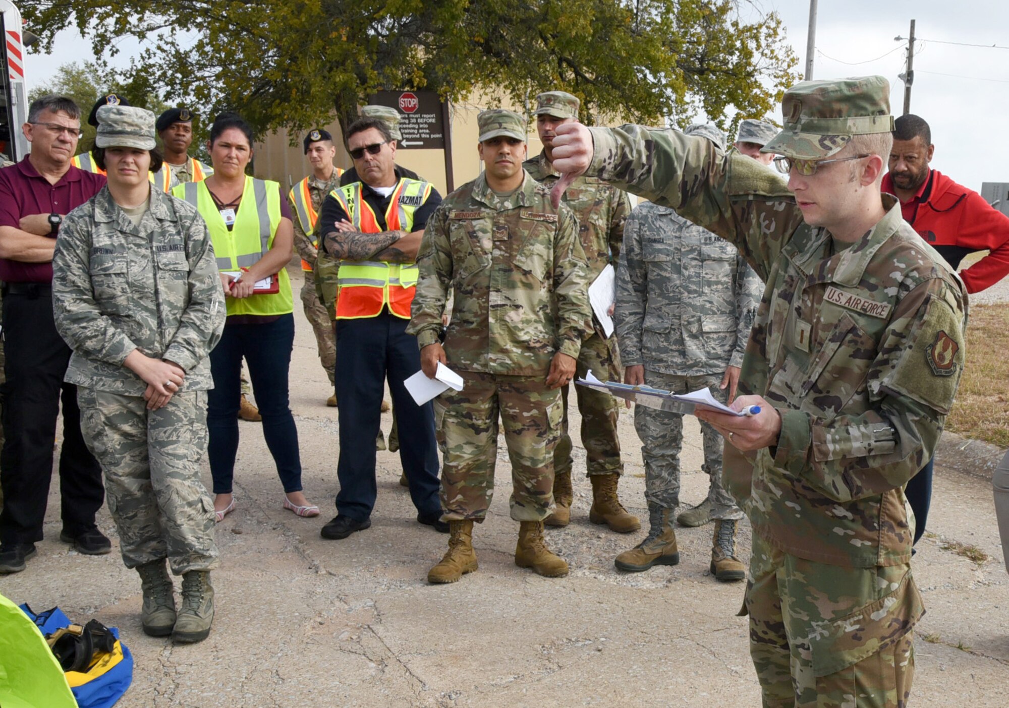 An image of Airmen receiving a safety briefing during a CBRNE exercise