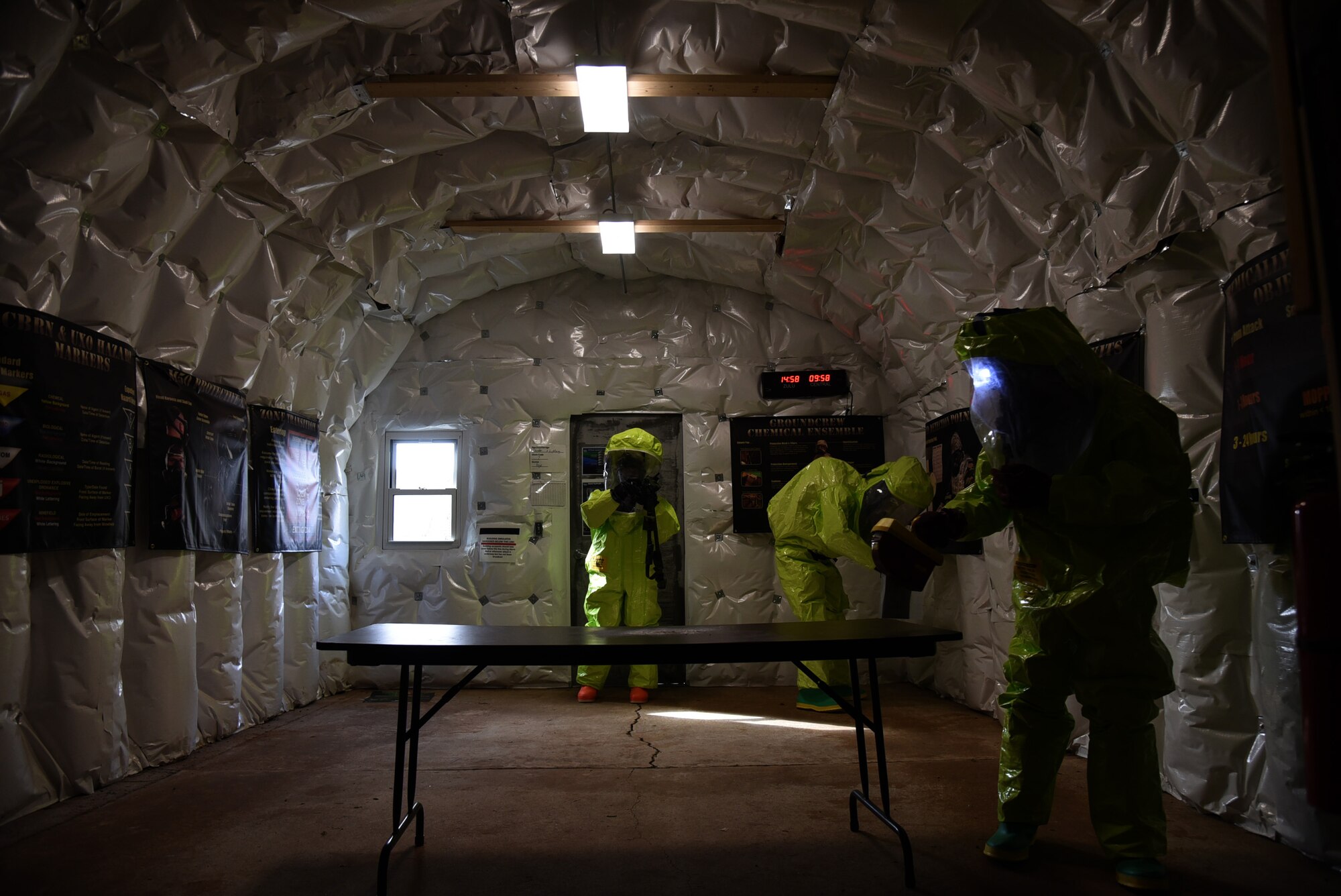 An image of an exercise team using sampling devices to determine the particular agent that was posing a threat