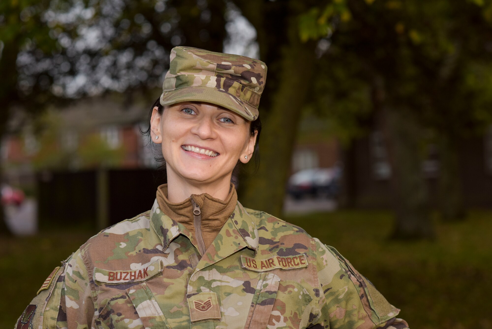 U.S. Air Force Staff Sgt. Olga Buzhak, 352nd Special Operations Wing financial analyst, poses for a picture at RAF Mildenhall, England, Oct.27,2019. Buzhak traveled from her birth place of Minsk, Belarus - not to leave a war-ridden country or to escape poverty- but simply to see a different, better life and a new experience in America. (U.S. Air Force photo by Senior Airman Alexandria Lee)