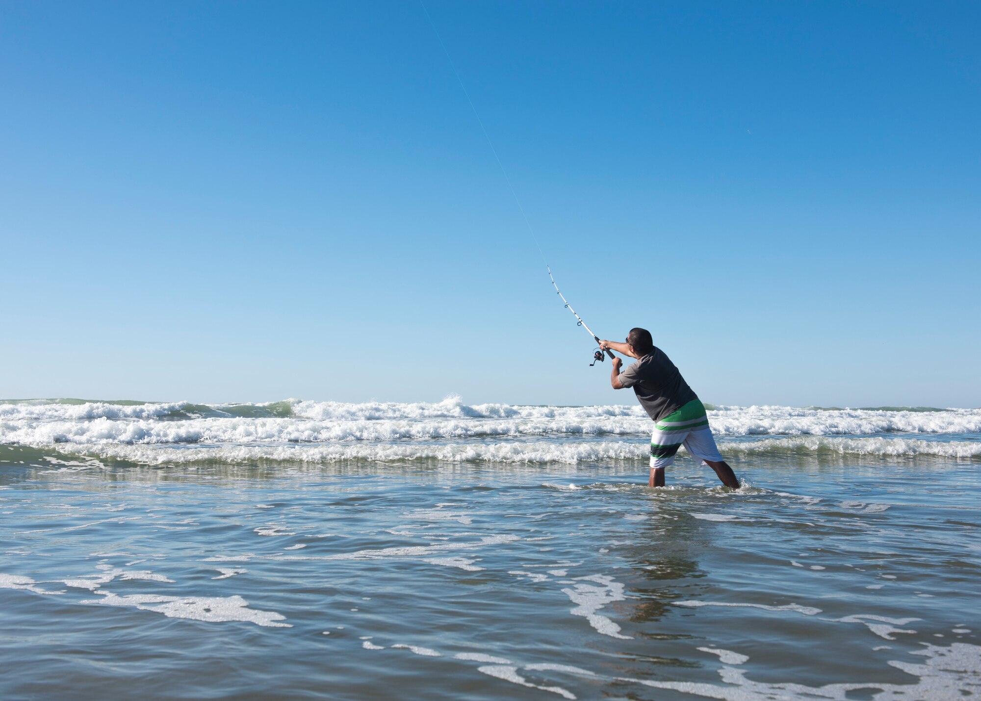 Master Sgt. Mike Iaukea, 14th Air Force Combined Force Space Component Command special missions division manager, enjoys an afternoon of fly fishing Oct. 24, 2019, near Wall beach at Vandenberg Air Force Base, Calif. Iaukea takes advantage of the coastline a few times a week to fish to unwind from his day-to-day life, which helps maintain his comprehensive health. (U.S. Air Force photo by Airman 1st Class Aubree Milks)