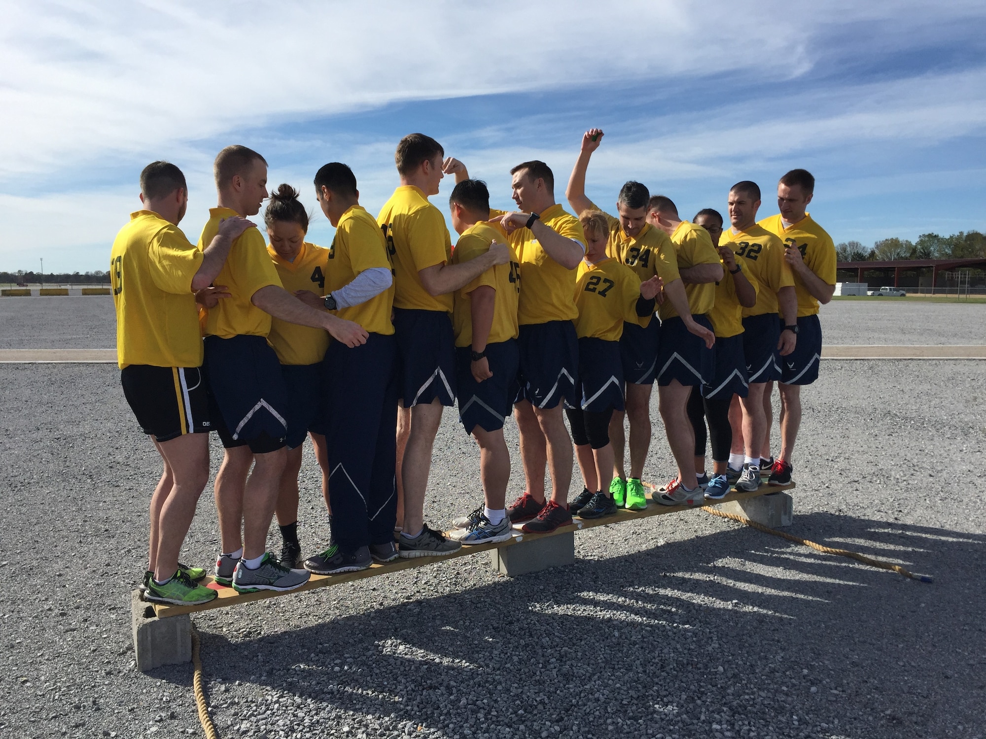 Air Force Materiel Command civilian Craig Smith (7th from left) completes a team-building task at Air Force Squadron Officer School. More than 735 Air Force Materiel Command Civilian Airmen were selected for Academic Year 2020 Civilian Developmental Education opportunities, filling nearly 49% of the Air Force program allocations for the academic year. (Courtesy photo)