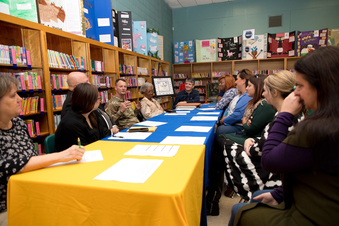 U.S. Army Corps of Engineers (USACE) Vicksburg District Commander Col. Robert A. Hilliard, Beechwood Elementary School principal David Adams, Vicksburg District outreach committee members and faculty and staff from Beechwood Elementary School discuss the adopt-a-school plan for the 2019-2020 school year at Beechwood Elementary School in Vicksburg, Mississippi, Nov. 4.
