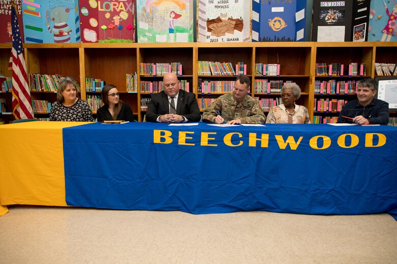 U.S. Army Corps of Engineers (USACE) Vicksburg District Commander Col. Robert A. Hilliard and Beechwood Elementary School principal David Adams sign an adoption certificate Nov. 4 at Beechwood Elementary School in Vicksburg, Mississippi, securing the 2019-2020 adopt-a-school partnership between the district and the school.