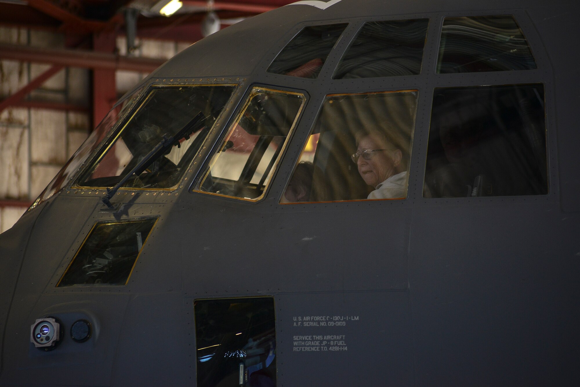 Nancy Bennett, sister of an ovarian cancer survivor, sits in the cockpit of an aircraft during the Warriors for Warriors event at Kirtland Air Force Base, N.M., Nov. 2, 2019. Bennett’s sister has attended all three events the Warriors for Warriors have hosted at the base. (U.S. Air Force photo by Staff Sgt. Kimberly Nagle)