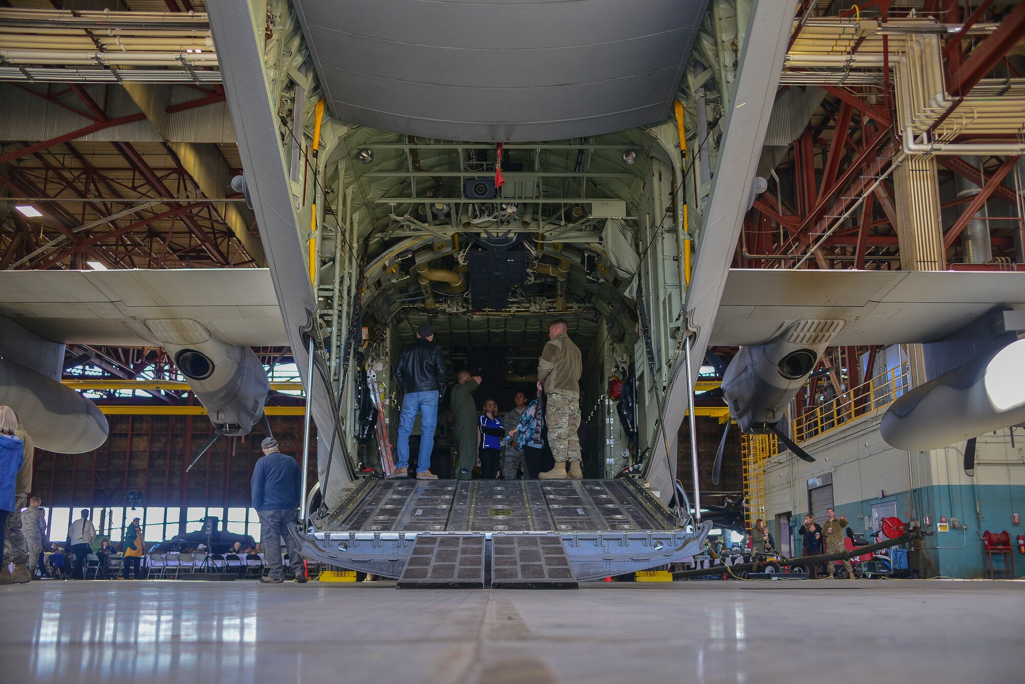 Airmen with the 58th Special Operations Wing show Warriors for Warriors event attendees the inside of an aircraft at Kirtland Air Force Base, N.M., Nov. 2, 2019. Additional members of the 58th SOW spent the entire event with the visitors showing them around and telling them about the different aircraft and the Air Force. (U.S. Air Force photo by Staff Sgt. Kimberly Nagle)