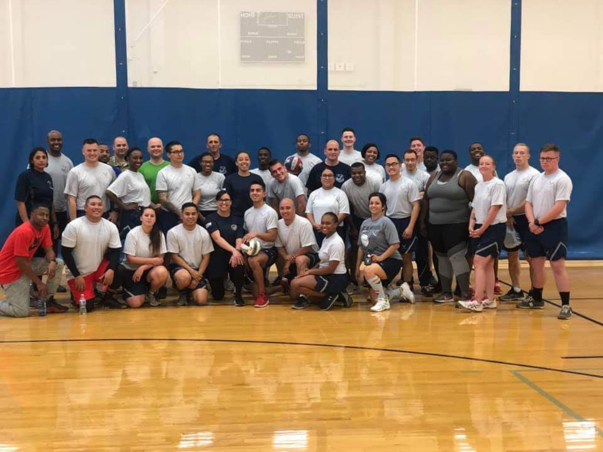 Airman Leadership School students pose with Vandenberg Air Force Base first sergeants after a volleyball match date, at Vandenberg Air Force Base, Calif. During ALS, students and first sergeants compete in a volleyball match and the winning team is given an award at the class graduation. (Courtesy photo)