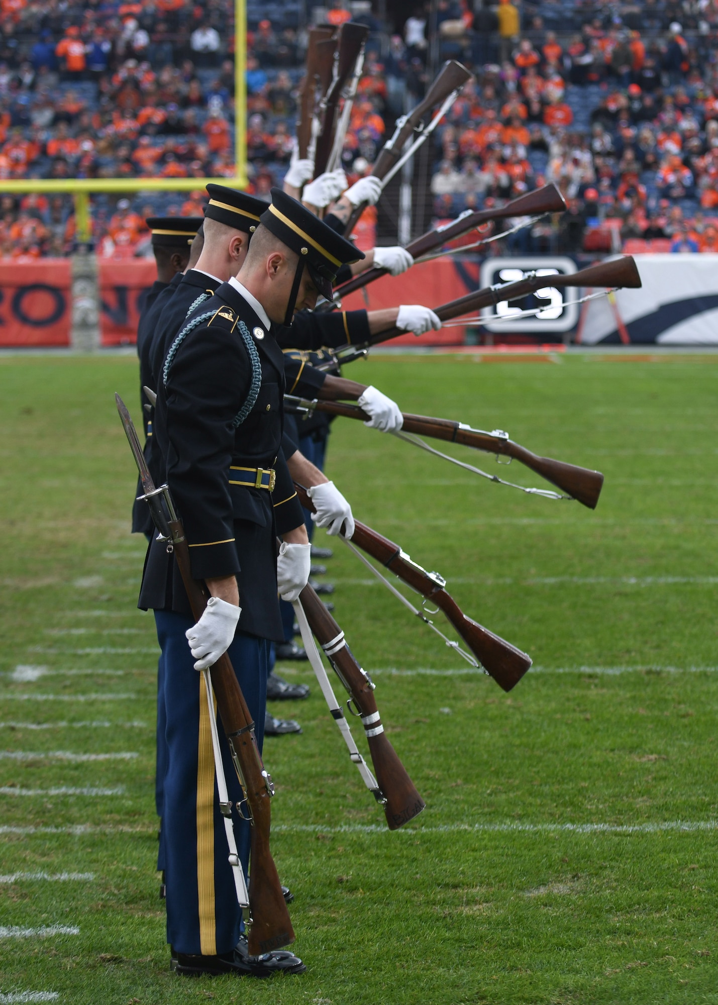 The U.S. Army Drill Team performs during the halftime show for the Denver Broncos Salute to Service game at Empower Field at Mile High in Denver, Nov. 3, 2019.