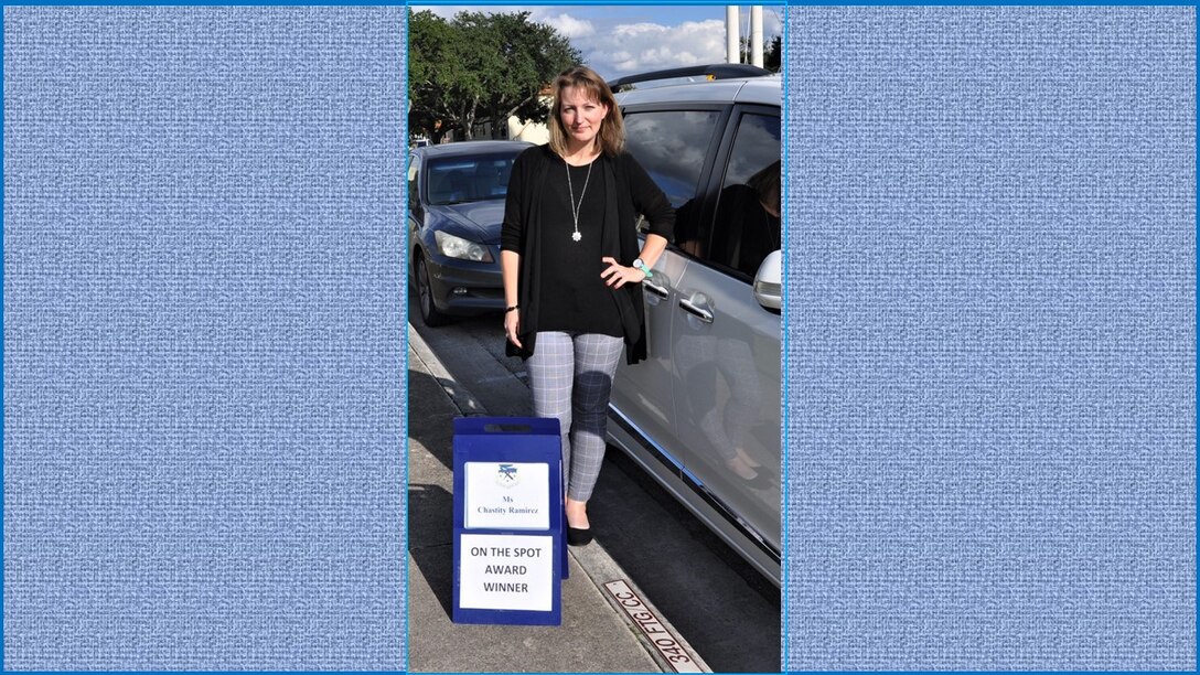 Chastity Ramirez, 340th Flying Training Financial Services travel lead, claims her time in the commander's parking spot following selection as the 340th FTG October On-the-Spot Award winner. Nicely Done Chastity! (U.S. Air Force photo by Janis El Shabazz)