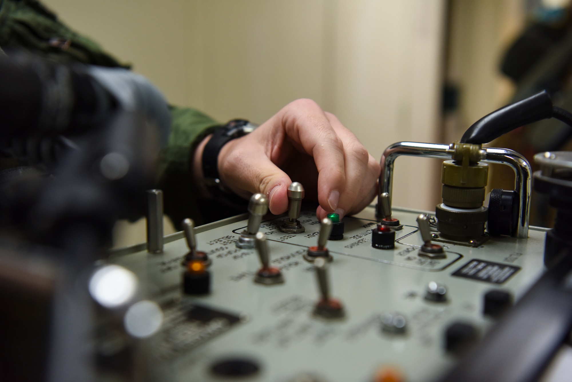 1st Lt. Sam Strickland, 69th Expeditionary Bomb Squadron electronic warfare officer, operates an Oxygen Mask Test Unit while testing his mask, pre-flight, on Andersen Air Force Base, Guam, Oct. 22, 2019. Strickland, along with other 69th EBS aircrew members, support the Continuous Bomber Presence, a mission that routinely forward deploys aircraft in support of global strike capability and regional security to our allies. (U.S. Air Force photo by Airman 1st Class Michael S. Murphy)