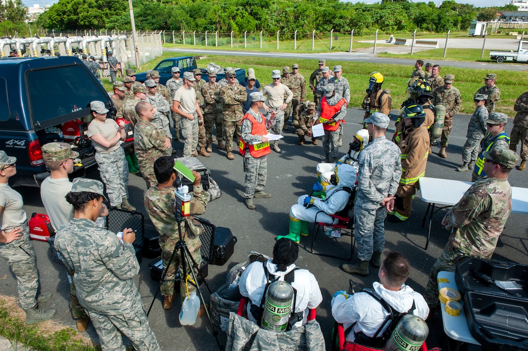 U.S. Air Force Master Sgt. Kyle Rollins, 18th Civil Engineer Squadron assistant chief of operations, gives a safety brief during a fuel spill exercise at Kadena Air Base, Japan, Oct. 25, 2019. This exercise gave Airmen the opportunity to hone emergency response and informed base leadership on the importance of developing and implementing a solid fuel spill prevention plan. (U.S. Air Force photo by Naoto Anazawa)