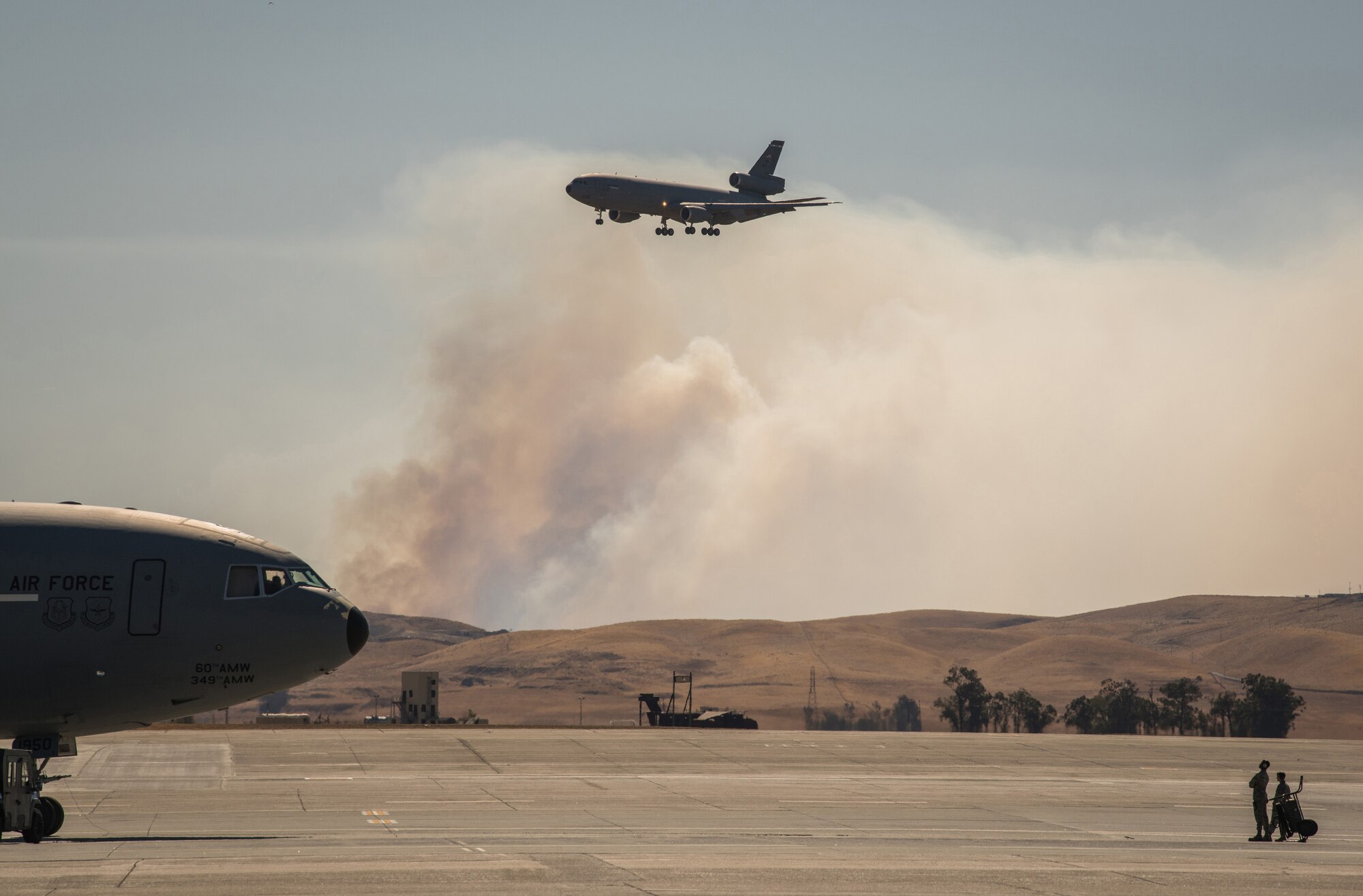 Photos of California Wildfires burn outside of Travis AFB
