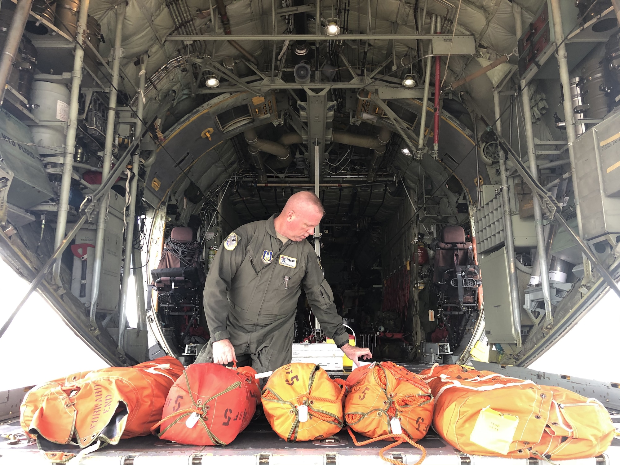 Tech. Sgt. Pat Englishby, 39th Rescue Squadron Load Master prepares the HC-130N Combat King aircraft to respond to the combined federal, Department of Defense, state and local rescue mission for a missing Airman in the Gulf of Mexico November 6, 2019. (U.S. Air Force video by Tech. Sgt. Kelly Goonan)