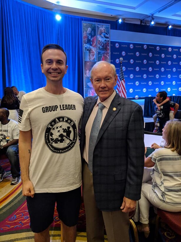 Maj. Louis Pagano, left, 21st Medical Squadron, director of psychological health, takes a photo with retired United States Army General Martin Dempsey, 18th Chairman of the Joint Chiefs of Staff, during the Tragedy Assistance Program for Survivors national event in Washington D.C. May25, 2018. Pagano is one of the 30 finalists for the Colorado Springs Mayor’s Young Leader Award. He has dedicated more than 175 hours to the Tragedy Assistance Program for Survivors, as a co-group lead and group leader. (U.S. Air Force courtesy photo)