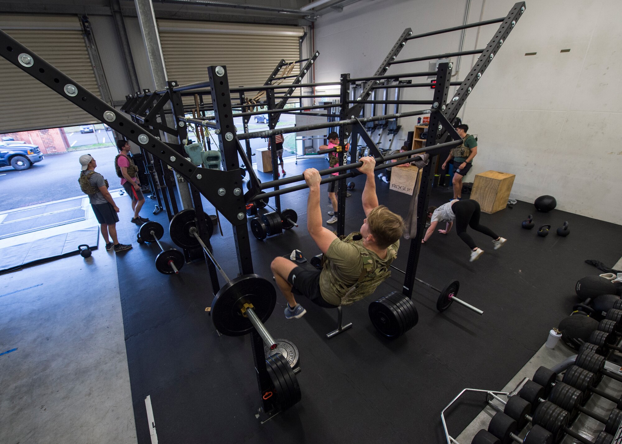 Service members of the 786th Civil Engineer Squadron explosive ordnance disposal flight participate in the 136 memorial workout at Ramstein Air Base, Germany, Nov. 5, 2019.