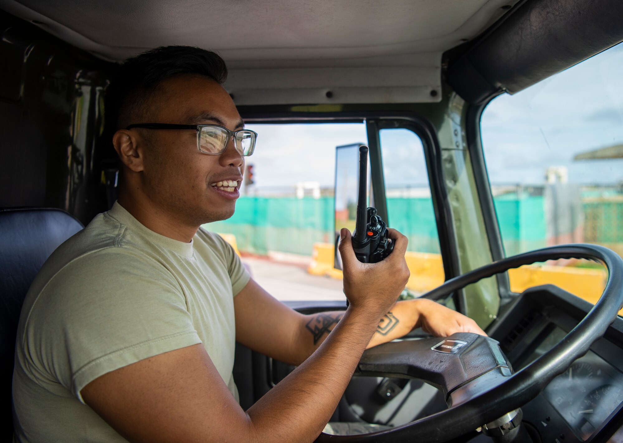 Airman 1st Class Zachary Alcantara, 36th Logistic Readiness Squadron distro operator, radios for help during a fuel spill exercise on Andersen Air Force Base, Guam, Nov. 6, 2019.