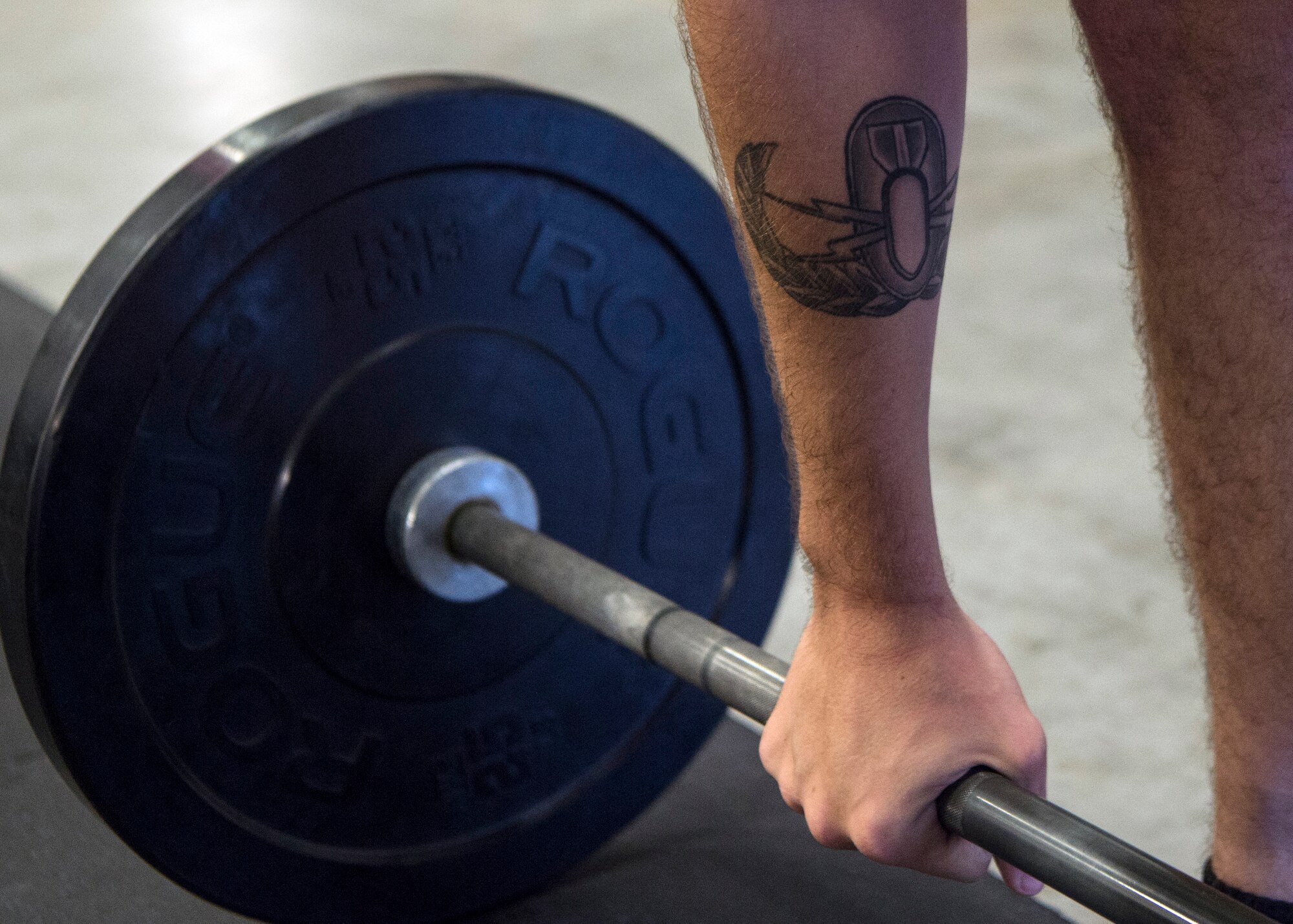 Senior Airman Jacob Hudson, 786th Civil Engineer Squadron explosive ordnance disposal technician, prepares to pick up a barbell at Ramstein Air Base, Germany, Nov. 5, 2019.