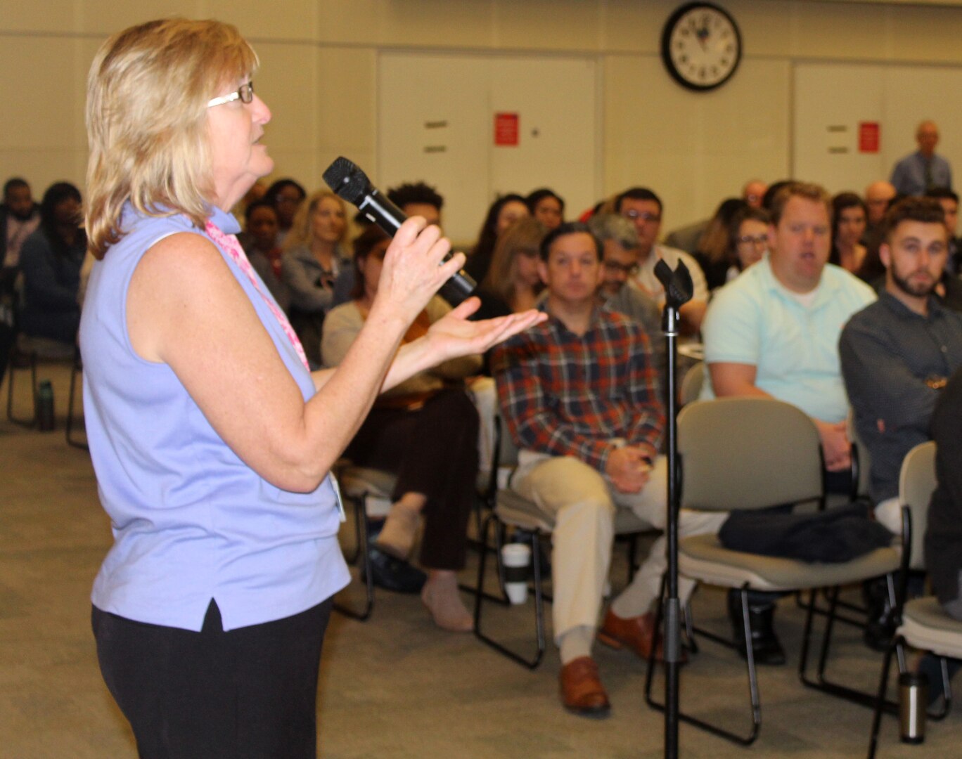 Joyce Pezick, foreground, a DLA Troop Support Industrial Hardware employee, clarifies a technical and engineering question posed by acquisition employees at an IH cross-functional event Nov. 5, 2019 in Philadelphia.