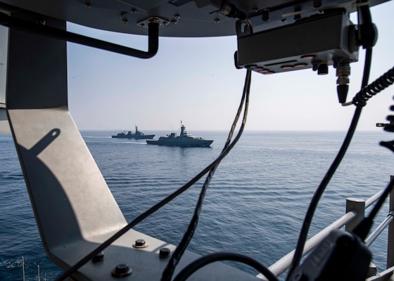 The Royal Navy of Oman Al Shamikh and the Pakistan Navy Ship Shamsheer  transit in formation beside the guided-missile cruiser USS Normandy (CG 60) as part of International Maritime Exercise 2019 (IMX 19). The exercise is a multinational engagement involving partners and allies from around the world designed to facilitate the sharing of knowledge and experiences across the full spectrum of defensive maritime operations. IMX 19 serves to demonstrate the global resolve in maintaining regional security and stability, freedom of navigation and the free flow of commerce from the Suez Canal south to the Bab el-Mandeb Strait through the Strait of Hormuz to the Northern Arabian Gulf. (U.S. Navy photo by Mass Communication Specialist 2nd Class Michael H. Lehman)