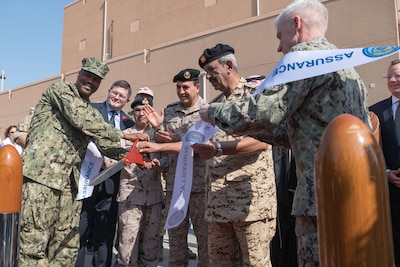 191107-N-KZ419-1001 NAVAL SUPPORT ACTIVITY BAHRAIN, Bahrain (Nov. 7, 2019)

Vice Adm. Jim Malloy, commander of U.S. Naval Forces Central Command, U.S. 5th Fleet and Combined Maritime Forces, right, Rear Adm. Alvin Holsey, commander of Coalition Task Force (CTF) Sentinel and other senior partner military leaders cut a ceremonial ribbon during the CTF Sentinel ribbon-cutting ceremony. CTF Sentinel is a multinational maritime effort to promote maritime stability, ensure safe passage, and enhance freedom of navigation throughout key waterways in the Arabian Gulf, Strait of Hormuz, the Bab el-Mandeb Strait and the Gulf of Oman. (U.S. Navy photo by Mass Communication Specialist 3rd Class Dawson Roth/Released)