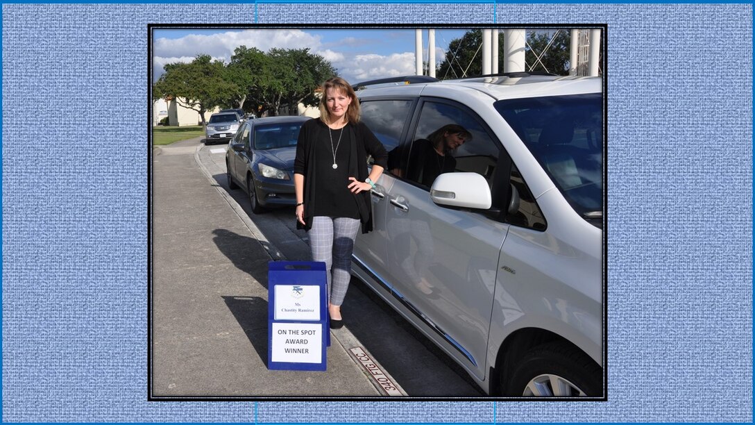 Chastity Ramirez, 340th Flying Training Financial Services travel lead, claims her time in the commander's parking spot following selection as the 340th FTG October On-the-Spot Award winner. Nicely Done Chastity! (U.S. Air Force photo by Janis El Shabazz)