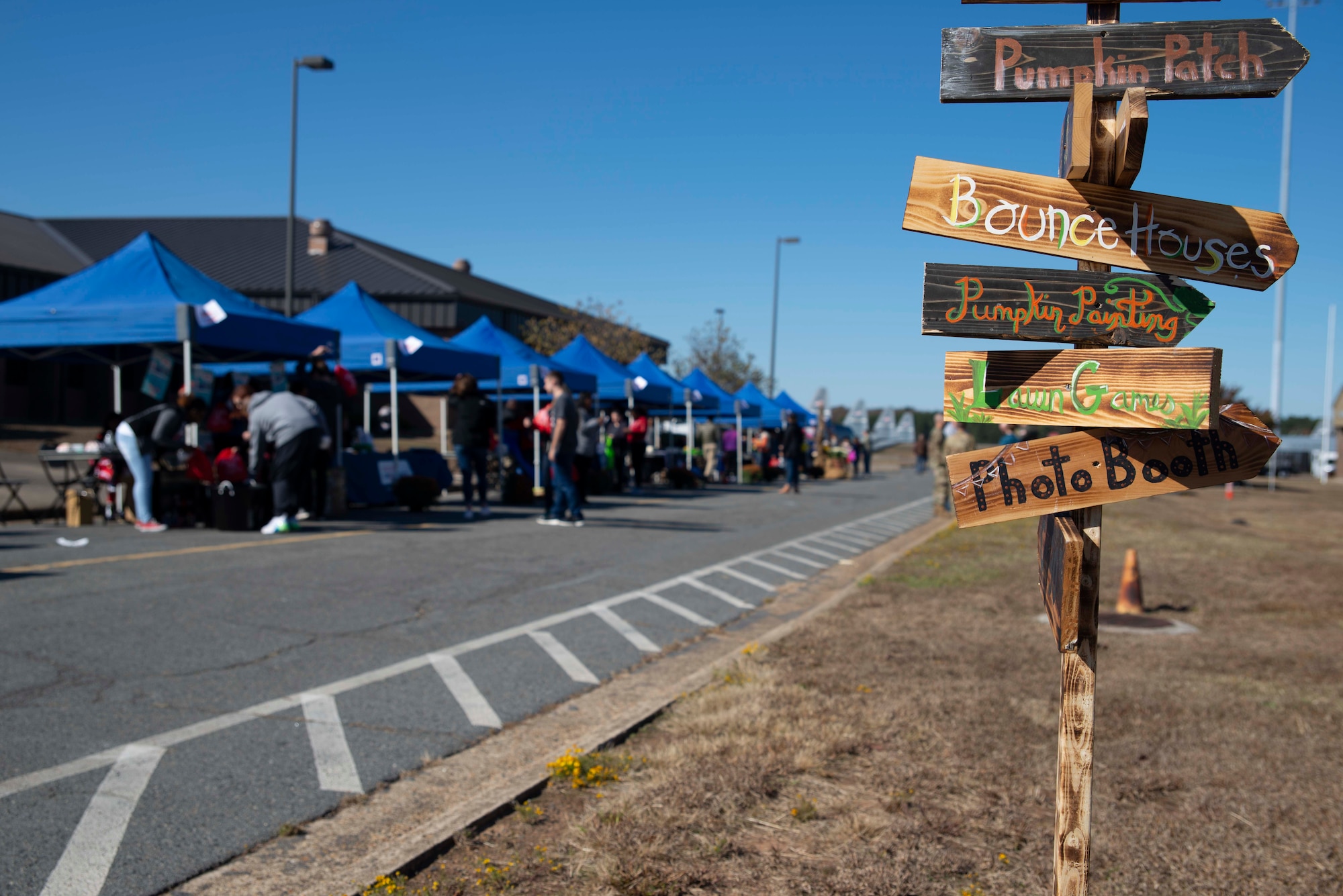 Multiple agencies and vendors line the 913th Airlift Group campus street to promote services and support to reserve members and their families during a family day event on Nov. 2, 2019, at Little Rock Air Force Base, Ark.  The 913th Airlift Group hosted the event, celebrating and showing appreciation for family members' support of their Airmen. (U.S. Air Force Reserve photo by Senior Airman Chase Cannon)