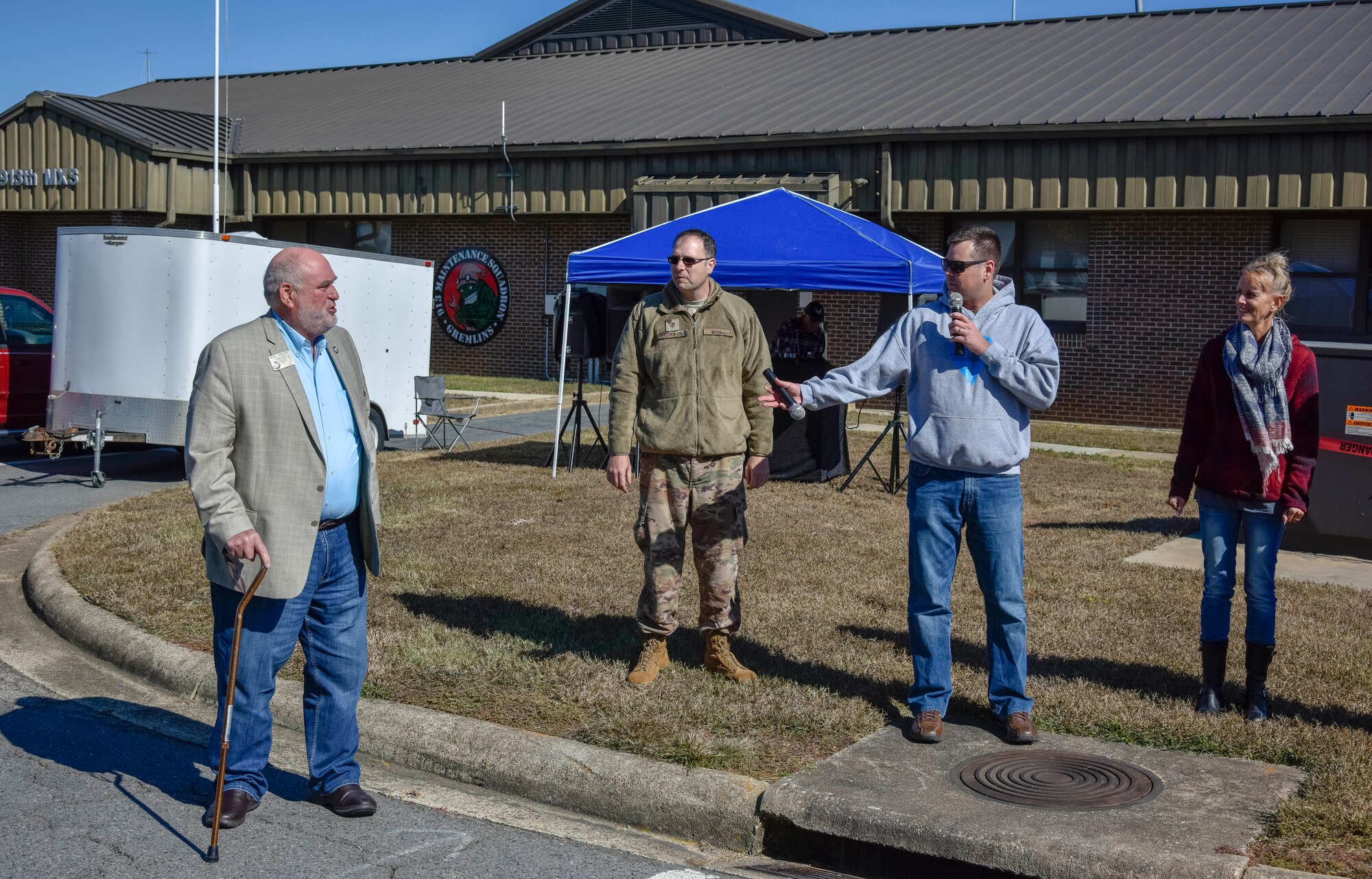 Mayor of Jacksonville (left), the honorable Bob Johnson, and Col. Daniel Collister, 913th Airlift Group deputy commander (right), provide opening remarks for the family day event on Nov. 2, 2019, at Little Rock Air Force Base, Ark. The 913th Airlift Group hosted the event, celebrating and showing appreciation for family members' support of their Airmen. (U.S. Air Force Reserve photo by Senior Airman Nathan Byrnes)