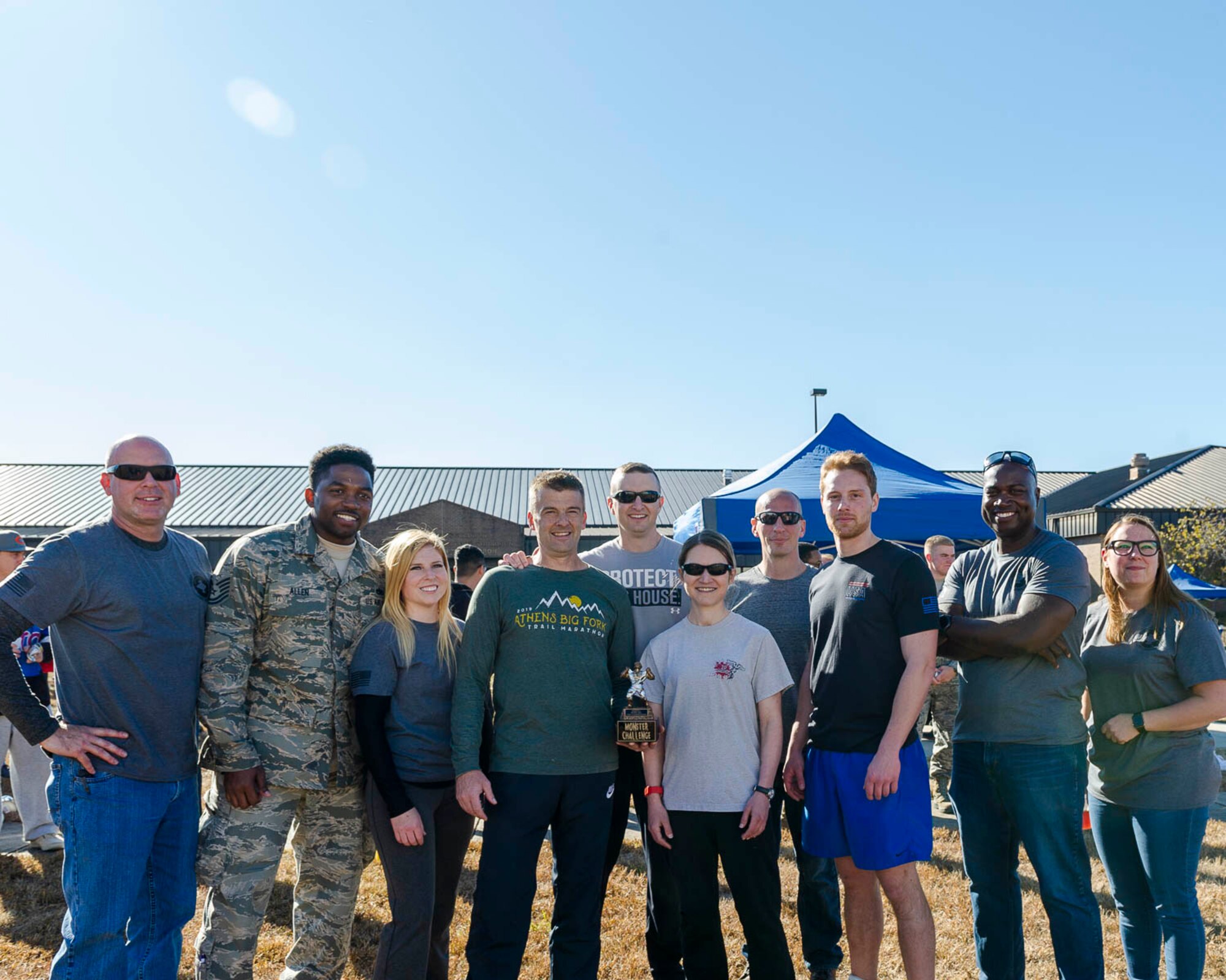 Reserve members from group staff agencies pose after winning the fitness challenge during the family day event Nov. 2, 2019, at Little Rock Air Force Base, Ark. The 913th Airlift Group hosted the event, celebrating and showing appreciation for family members' support of their Airmen. (U.S. Air Force Reserve photo by Maj. Ashley Walker)