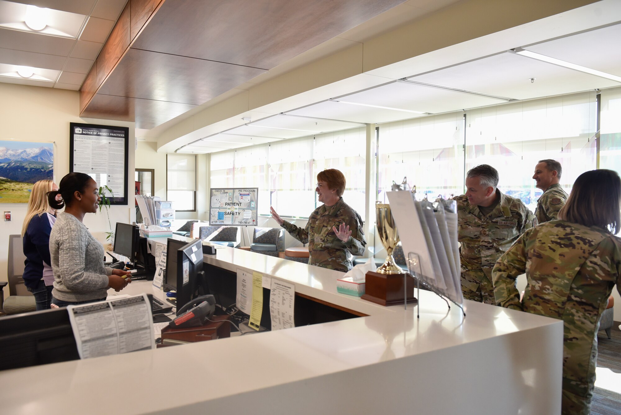 Lt. Gen. Dorothy Hogg, U.S. Air Force Surgeon General, and members of the 21st Medical Group leadership visit the dental clinic on Peterson Air Force Base, Colorado, Nov. 1, 2019. Hogg and Chief Master Sgt. Steve Cum, Medical Enlisted Force and Enlisted Corps chief, were able to visit the medical sections on Schriever Air Force Base and Peterson, as well as meet the Airmen who work in those sections. (U.S. Air Force photo by Airman Alexis Christian)