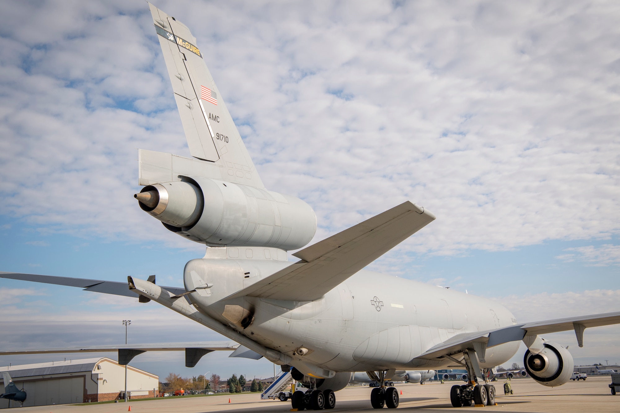 A KC-10 Extender from Joint Base McGuire-Dix-Lakehurst, New Jersey, sits on the parking ramp at Grissom Air Reserve Base, Indiana Nov. 6, 2019. The aircraft is powered by three General Electric CF6-50C2 turbofan engines with the third being located at the base of the tail above the rear fuselage. (U.S. Air Force photo/Master Sgt. Ben Mota)