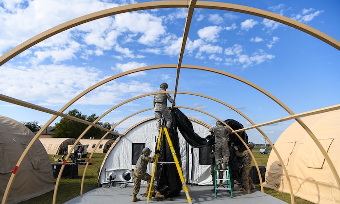 Airmen assigned to the 628th Civil Engineer Squadron break down tents that were used for Palmetto Challenge in preparation for the redeployment order at McEntire Joint National Guard Base, S.C., Nov. 4, 2019. The goal of the exercise was to develop and maintain full-spectrum readiness and ensure JB Charleston’s Airmen were ready for rapid mobilization and able to support Air Mobility Command and DOD priorities. Both active-duty and reserve Airmen from the 628th Air Base Wing, 437th Airlift Wing and 315th Airlift Wing came together to train in operating in an austere environment. More than 140 Airmen took part in the global mobilization readiness exercise at McEntire Joint National Guard Base, and Pope Army Airfield, S.C. (U.S. Air Force photo by Senior Airman Cody R. Miller)