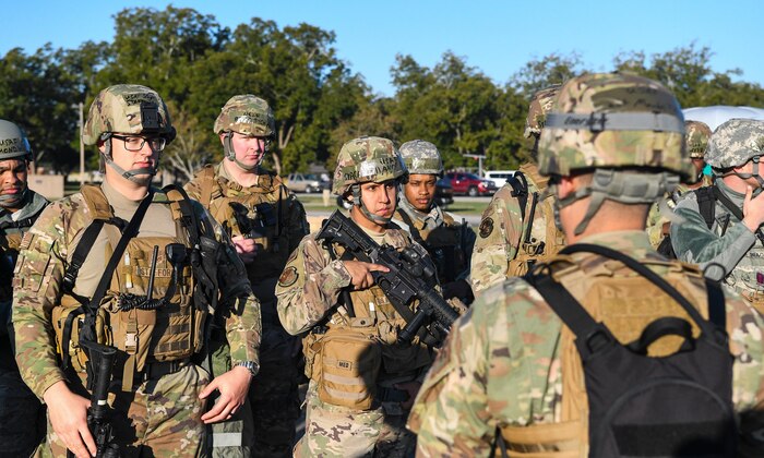 Defenders assigned to the 628th Security Forces Squadron receive their morning briefing during exercise Palmetto Challenge at McEntire Joint National Guard Base, S.C., Nov. 3, 2019. The goal of the exercise was to develop and maintain full-spectrum readiness and ensure JB Charleston’s Airmen were ready for rapid mobilization and able to support Air Mobility Command and DOD priorities. Both active-duty and reserve Airmen from the 628th Air Base Wing, 437th Airlift Wing and 315th Airlift Wing came together to train in operating in an austere environment. More than 140 Airmen took part in the global mobilization readiness exercise at McEntire Joint National Guard Base, and Pope Army Airfield, S.C.